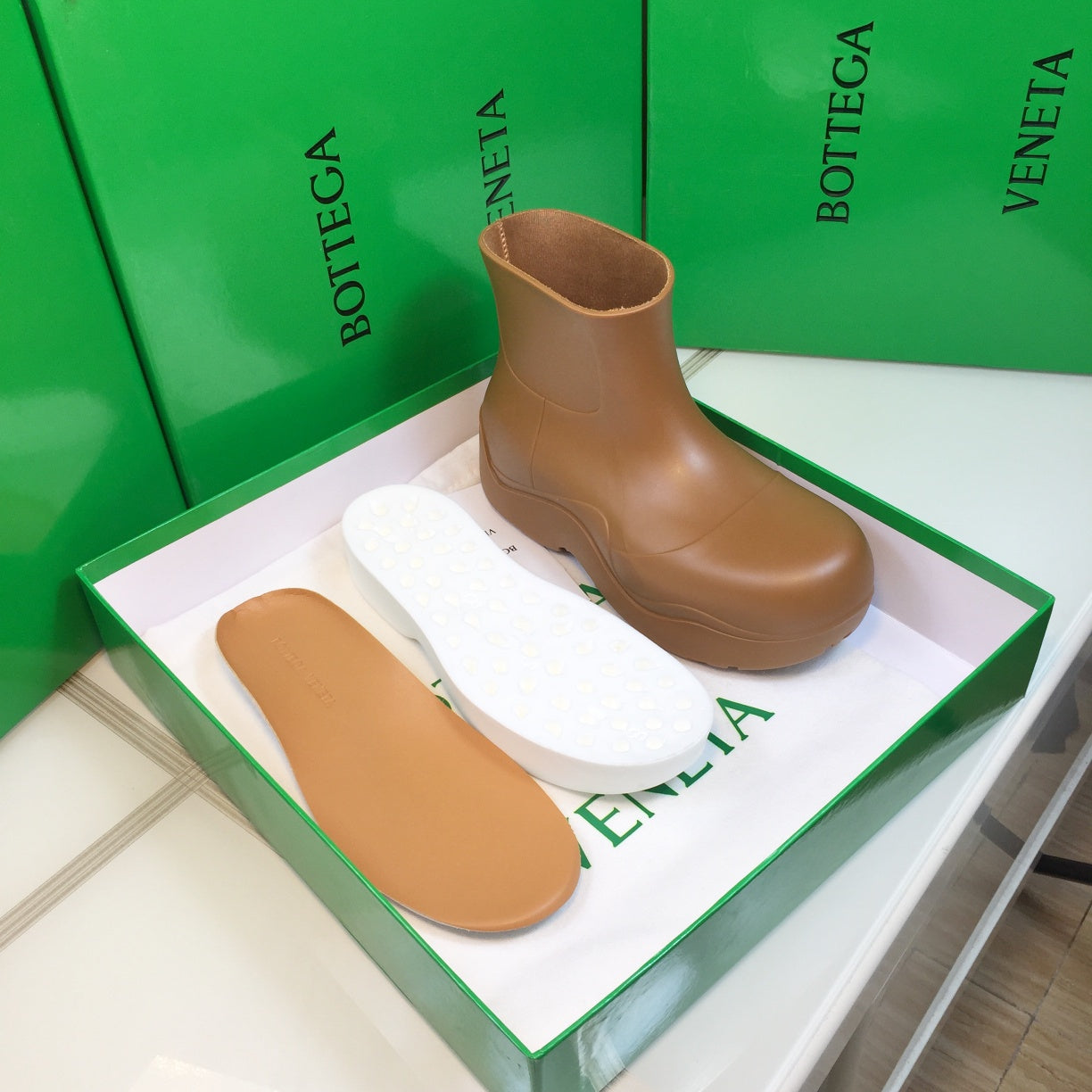 BOTTEGA VENETA PUDDLE ANKLE BOOT IN CAMEL BEIGE RUBBER