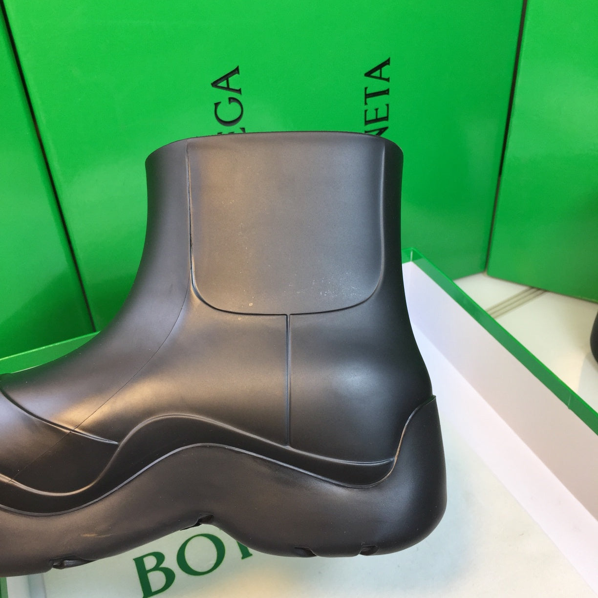 BOTTEGA VENETA PUDDLE ANKLE BOOT IN BLACK RUBBER