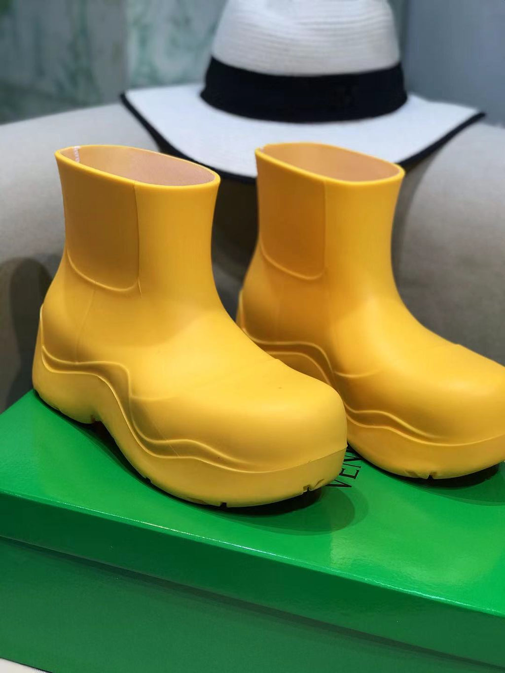 BOTTEGA VENETA PUDDLE ANKLE BOOT IN BRIGHT YELLOW RUBBER