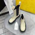 BOTTEGA VENETA TIRE CHELSEA BOOT IN BLACK MIX BISQUE BEIGE CALFSKIN WITH TRANSPARENT SOLE