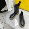 BOTTEGA VENETA TIRE CHELSEA BOOT IN BLACK MIX OLIVE GREEN CALFSKIN