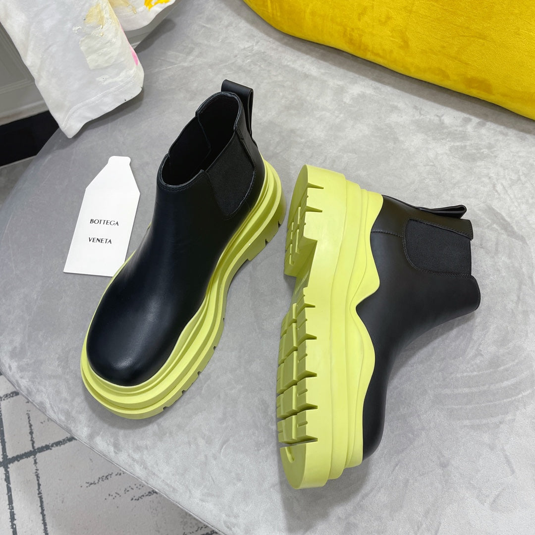 BOTTEGA VENETA TIRE CHELSEA BOOT IN BLACK MIX NEON YELLOW CALFSKIN