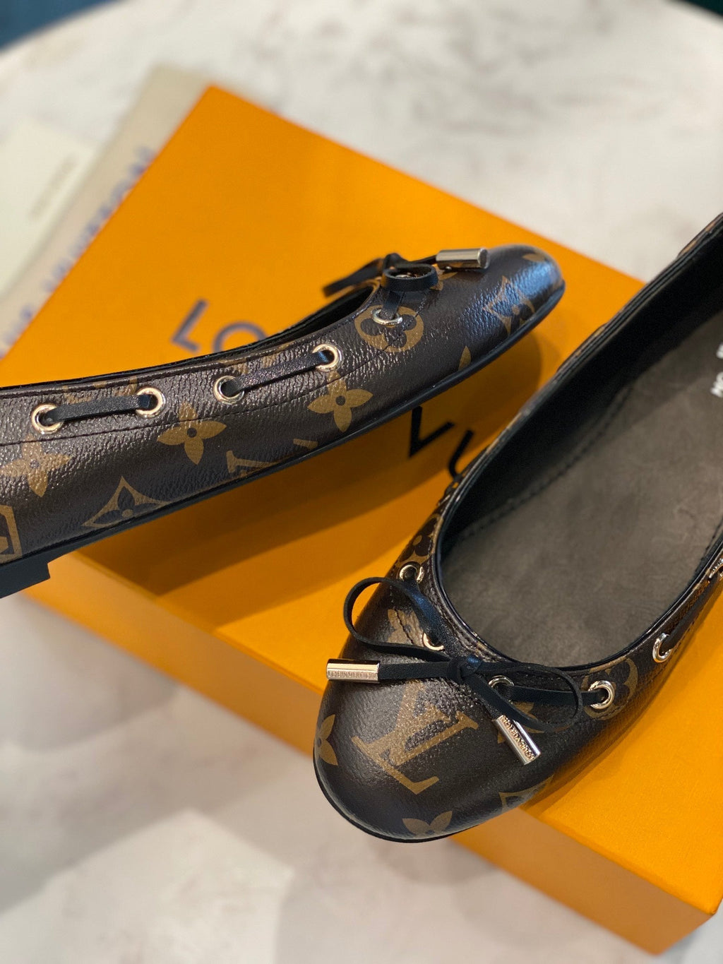 LOUIS VUITTON LV WOMEN'S BALLET FLAT IN CHOCOLATE BROWN MONOGRAM CALFSKIN WITH BOW