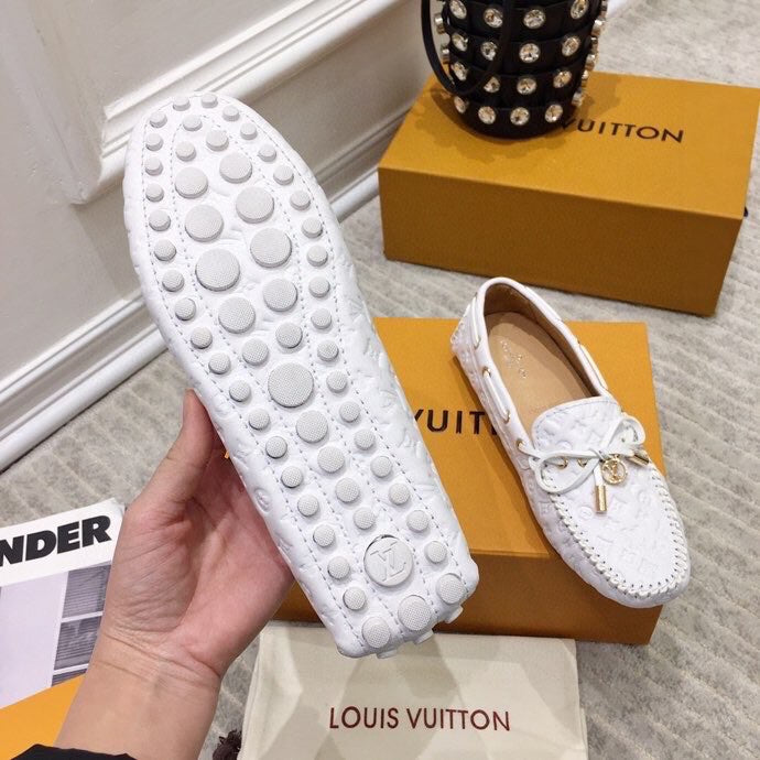 LOUIS VUITTON LV WOMEN'S DRIVER MOCCASIN IN WHITE EMBOSSED CALFSKIN