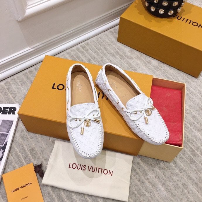 LOUIS VUITTON LV WOMEN'S DRIVER MOCCASIN IN WHITE EMBOSSED CALFSKIN