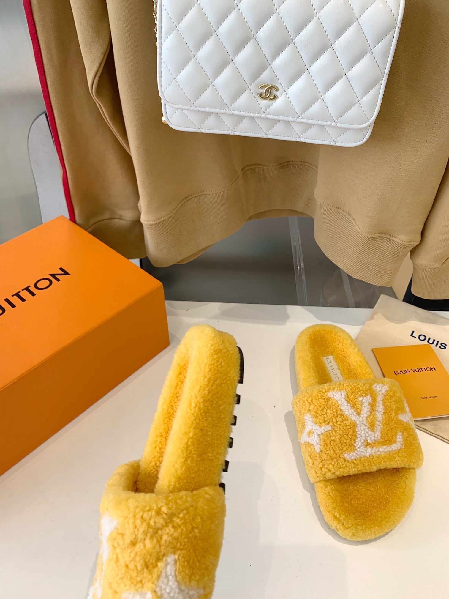 LOUIS VUITTON LV WOMEN'S PASEO FLAT SLIPPER IN YELLOW FLEECE WITH WHITE LOGO