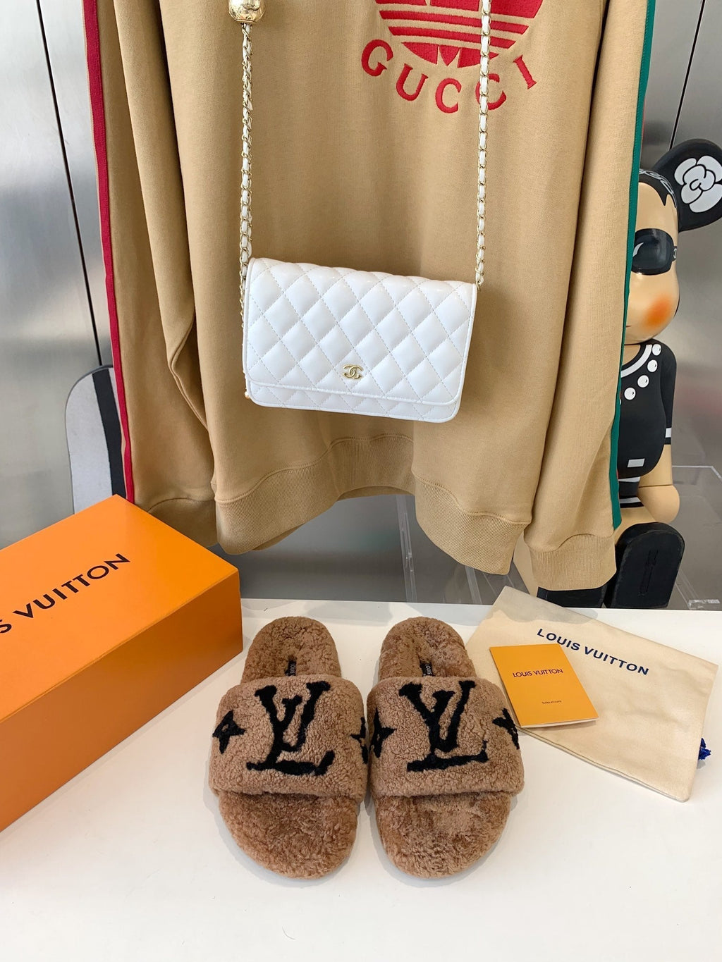 LOUIS VUITTON LV WOMEN'S PASEO FLAT SLIPPER IN CARAMEL BROWN FLEECE WITH BLACK LOGO