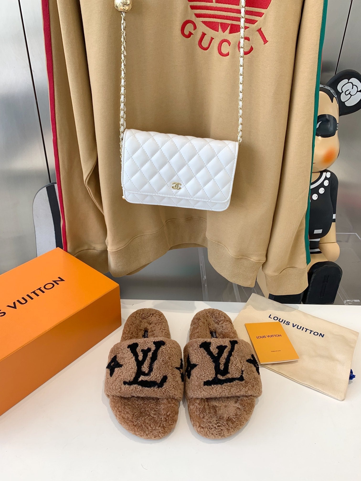LOUIS VUITTON LV WOMEN'S PASEO FLAT SLIPPER IN CARAMEL BROWN FLEECE WITH BLACK LOGO