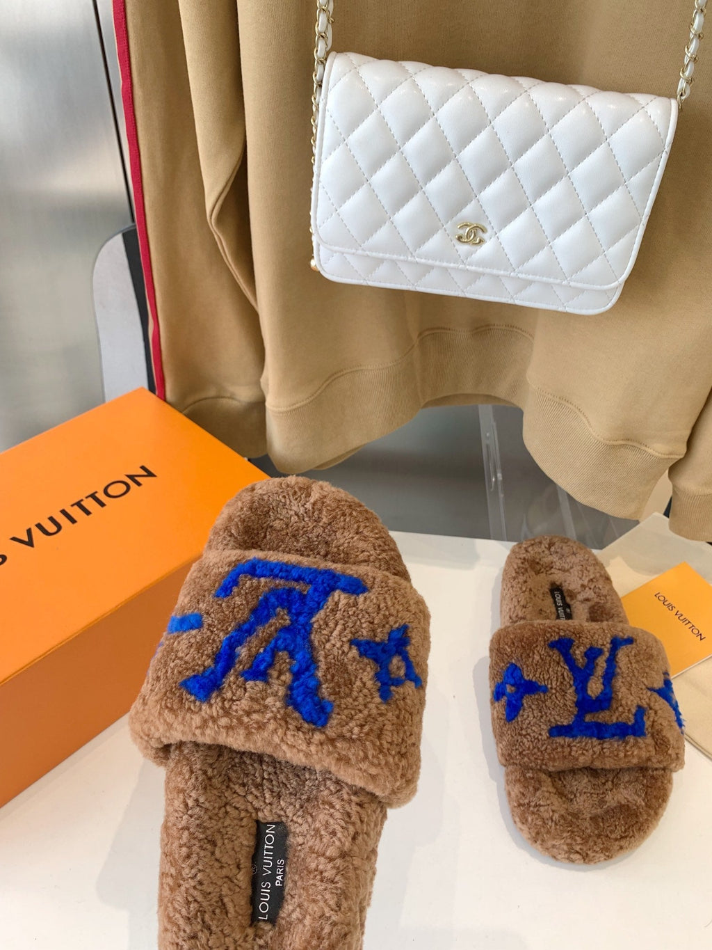 LOUIS VUITTON LV WOMEN'S PASEO FLAT SLIPPER IN BROWN FLEECE WITH BLUE LOGO
