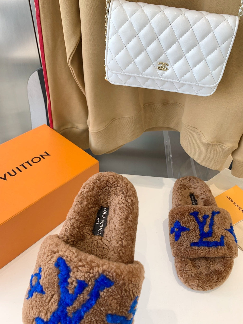 LOUIS VUITTON LV WOMEN'S PASEO FLAT SLIPPER IN BROWN FLEECE WITH BLUE LOGO