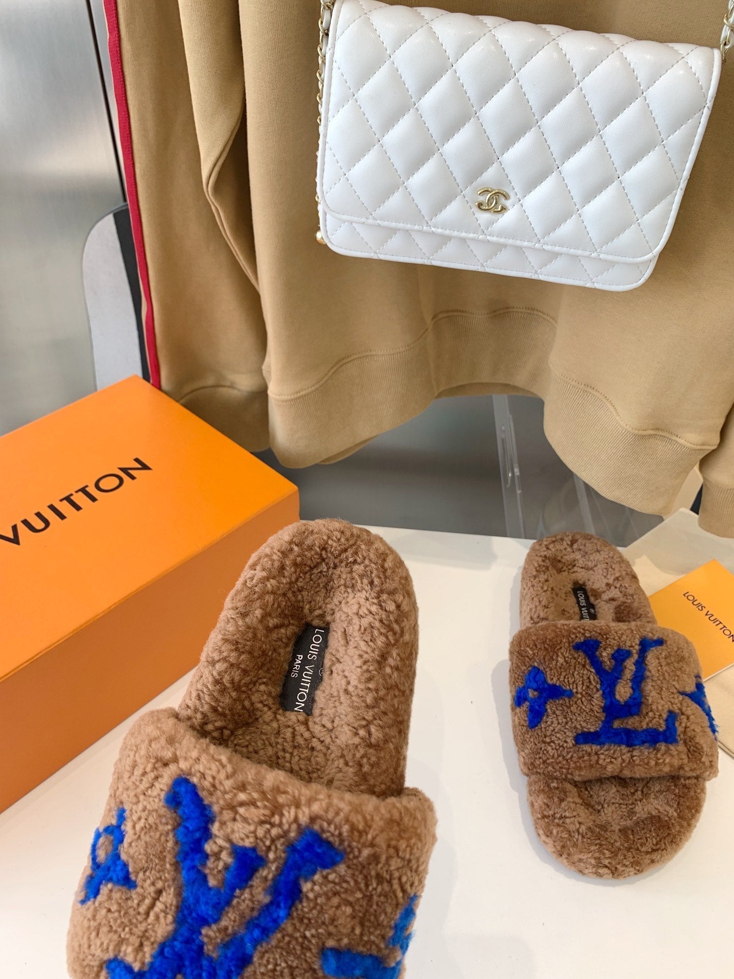 LOUIS VUITTON LV WOMEN'S PASEO FLAT SLIPPER IN BROWN FLEECE WITH BLUE LOGO