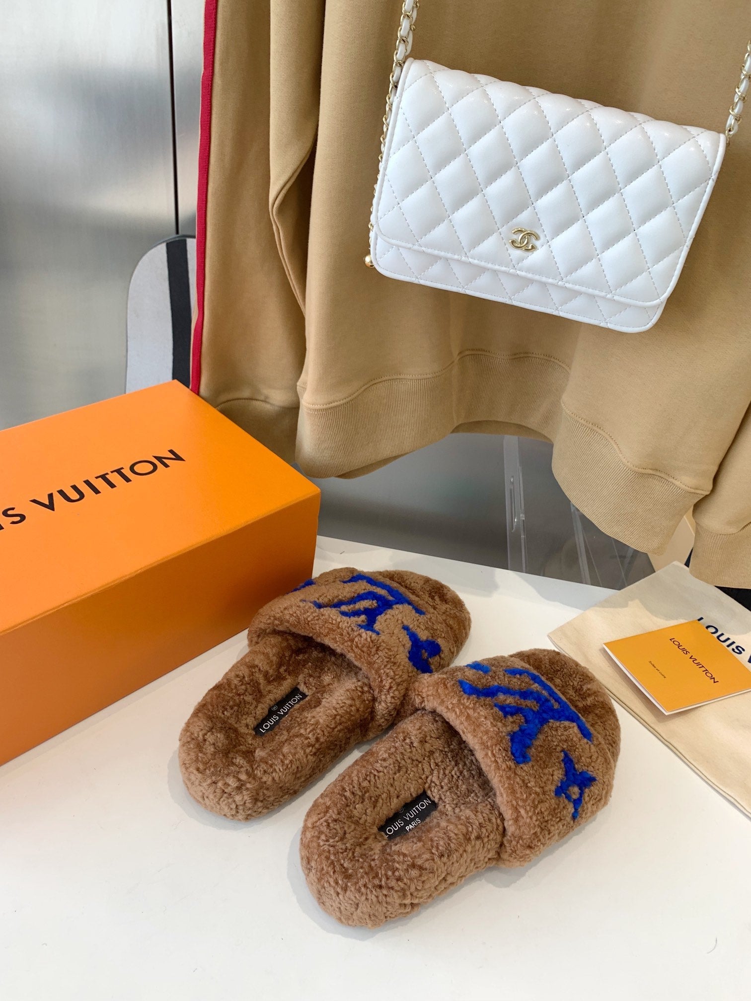 LOUIS VUITTON LV WOMEN'S PASEO FLAT SLIPPER IN BROWN FLEECE WITH BLUE LOGO