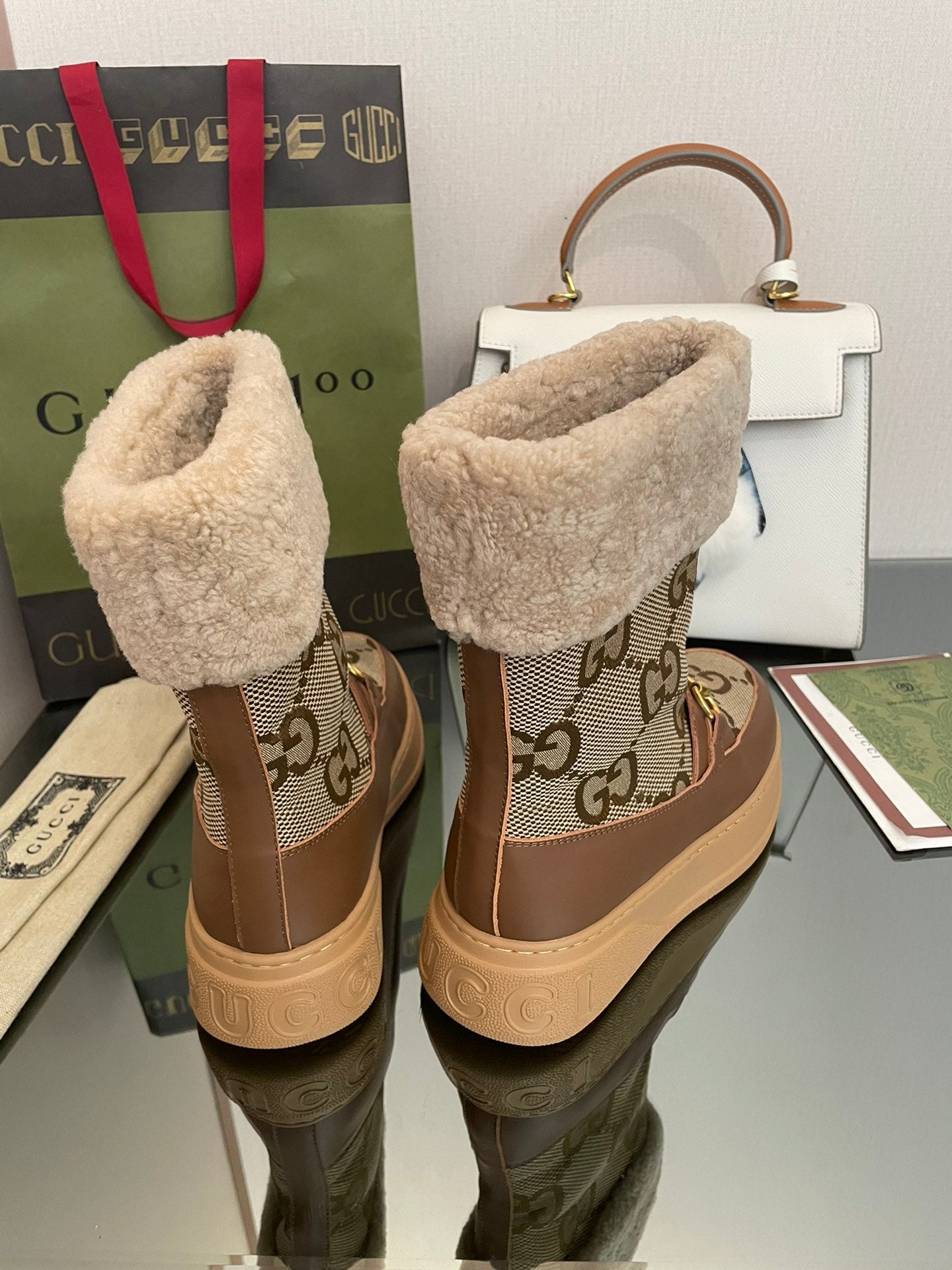 GUCCI HORSEBIT SNOW ANKLE BOOTS IN ECRU BEIGE MONOGRAM JACQUARD FABRIC MIX BROWN CALFSKIN AND LAMB WOOL LINING