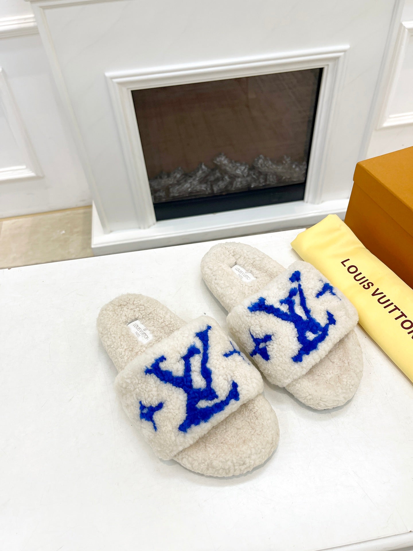 LOUIS VUITTON LV FLAT SLIPPER IN WHITE MIX COBALT BLUE SHEARLING