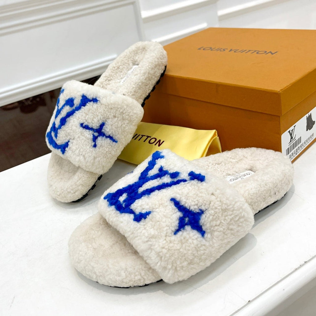 LOUIS VUITTON LV FLAT SLIPPER IN WHITE MIX COBALT BLUE SHEARLING