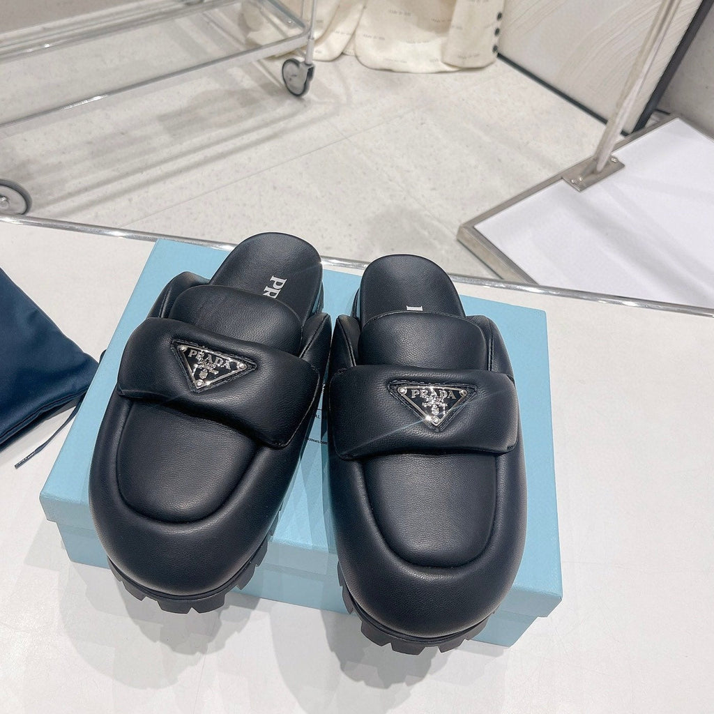 PRADA SOFT PADDED NAPPA SHEARLING MULES BLACK LAMBSKIN