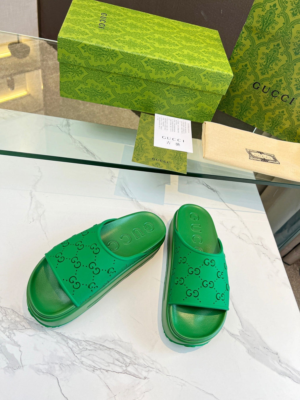 GUCCI PLATFORM SANDALS IN EMERALD GREEN MONOGRAM IMPORTED TPU