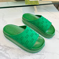 GUCCI PLATFORM SANDALS IN EMERALD GREEN MONOGRAM IMPORTED TPU