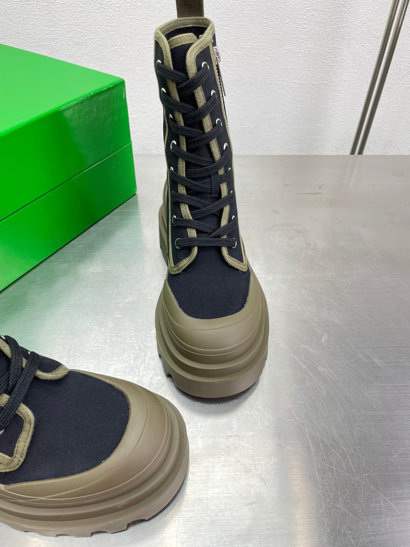 BOTTEGA VENETA RIBBON BOMBER LACE-UP BOOTS IN BLACK MIX OLIVE GREEN CANVAS