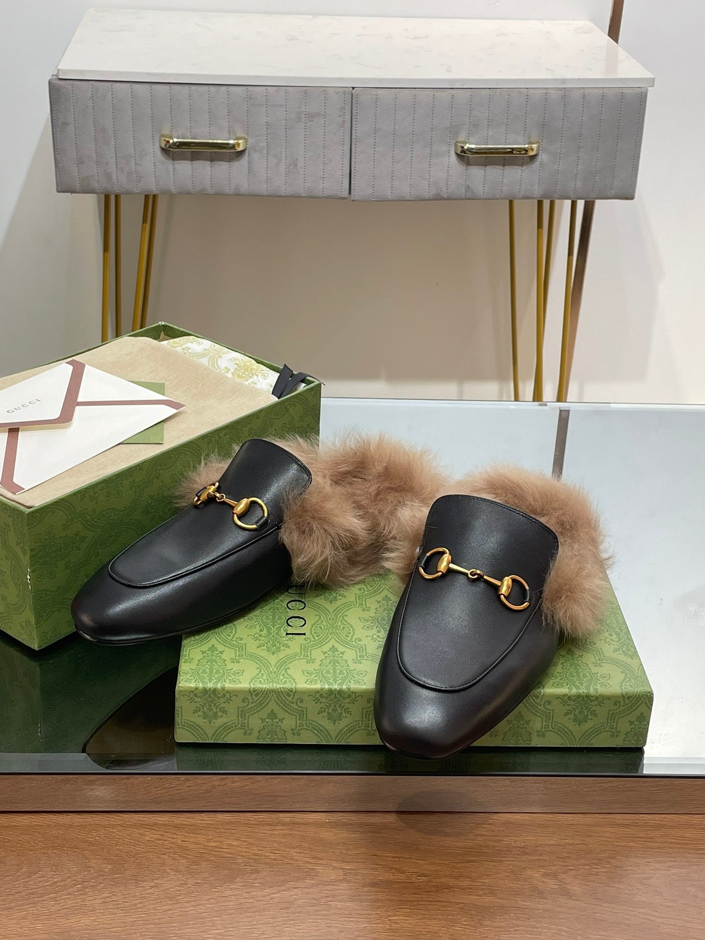 GUCCI HORSEBIT MULE IN BLACK CALFSKIN AND LAMB WOOL LINING