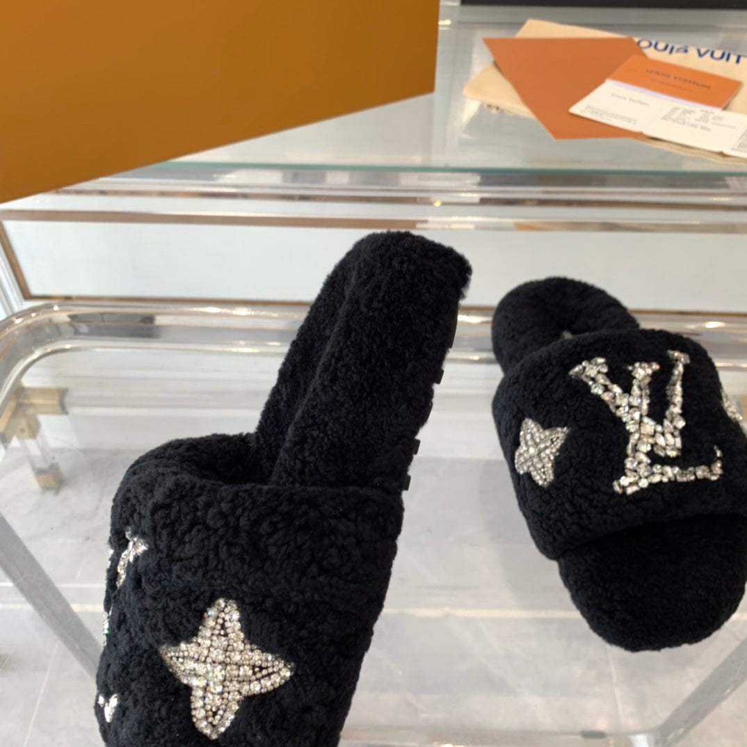 LOUIS VUITTON LV WOMEN'S PASEO FLAT SLIPPER IN BLACK FLEECE