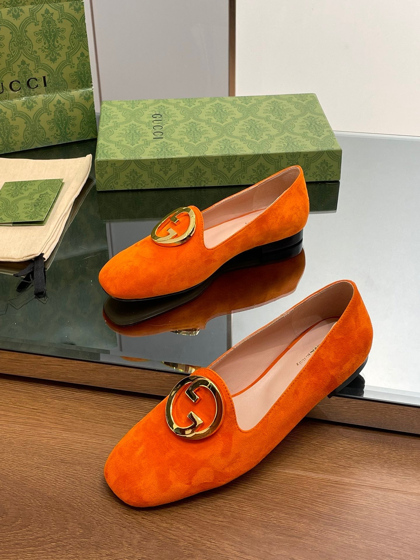 GUCCI BLONDIE LOGO-PLAQUE LOAFERS IN TIGER ORANGE SUEDE WITH GOLD HARDWARE
