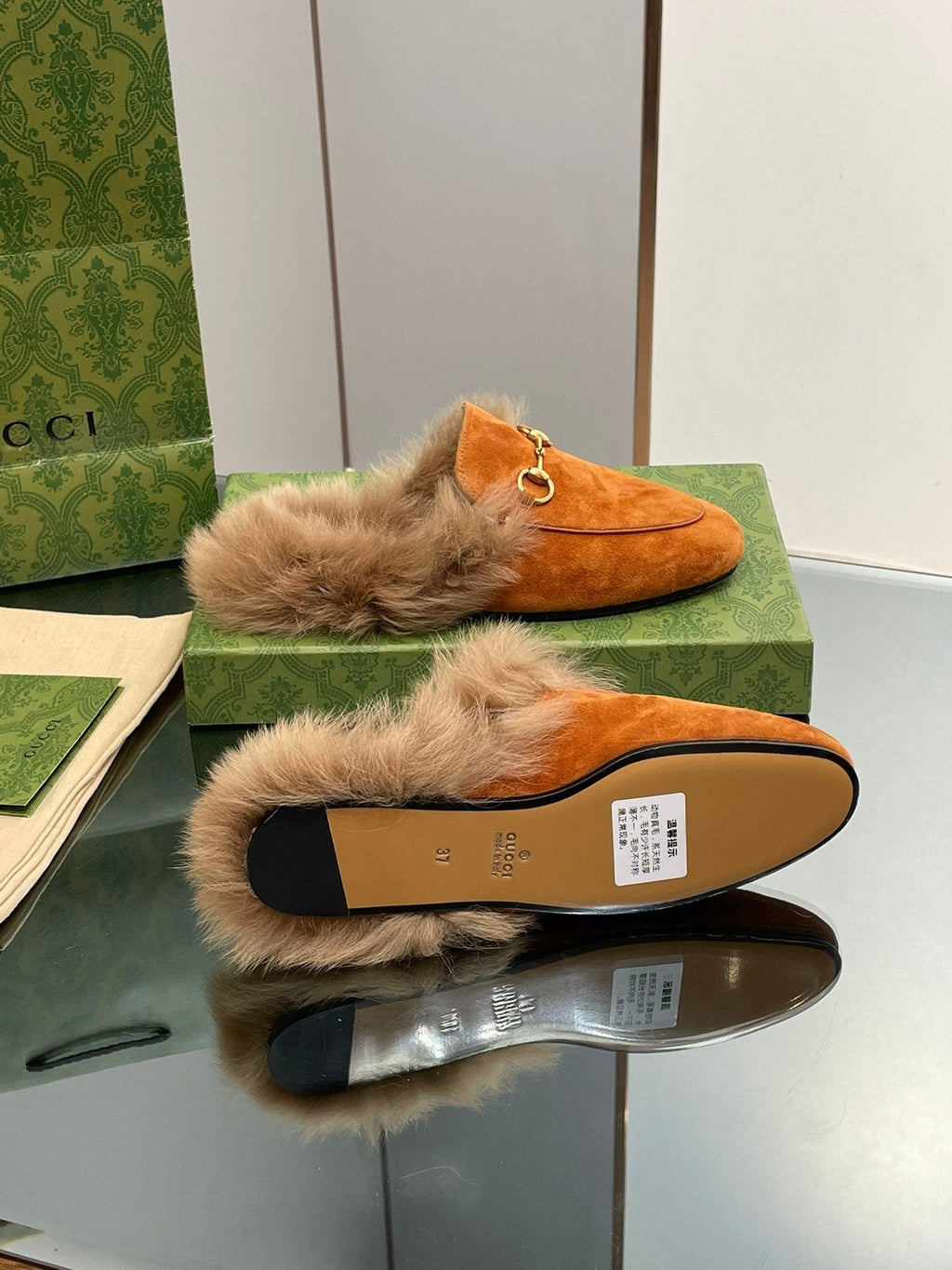 GUCCI HORSEBIT MULE IN BRONZE ORANGE SUEDE AND LAMB WOOL LINING