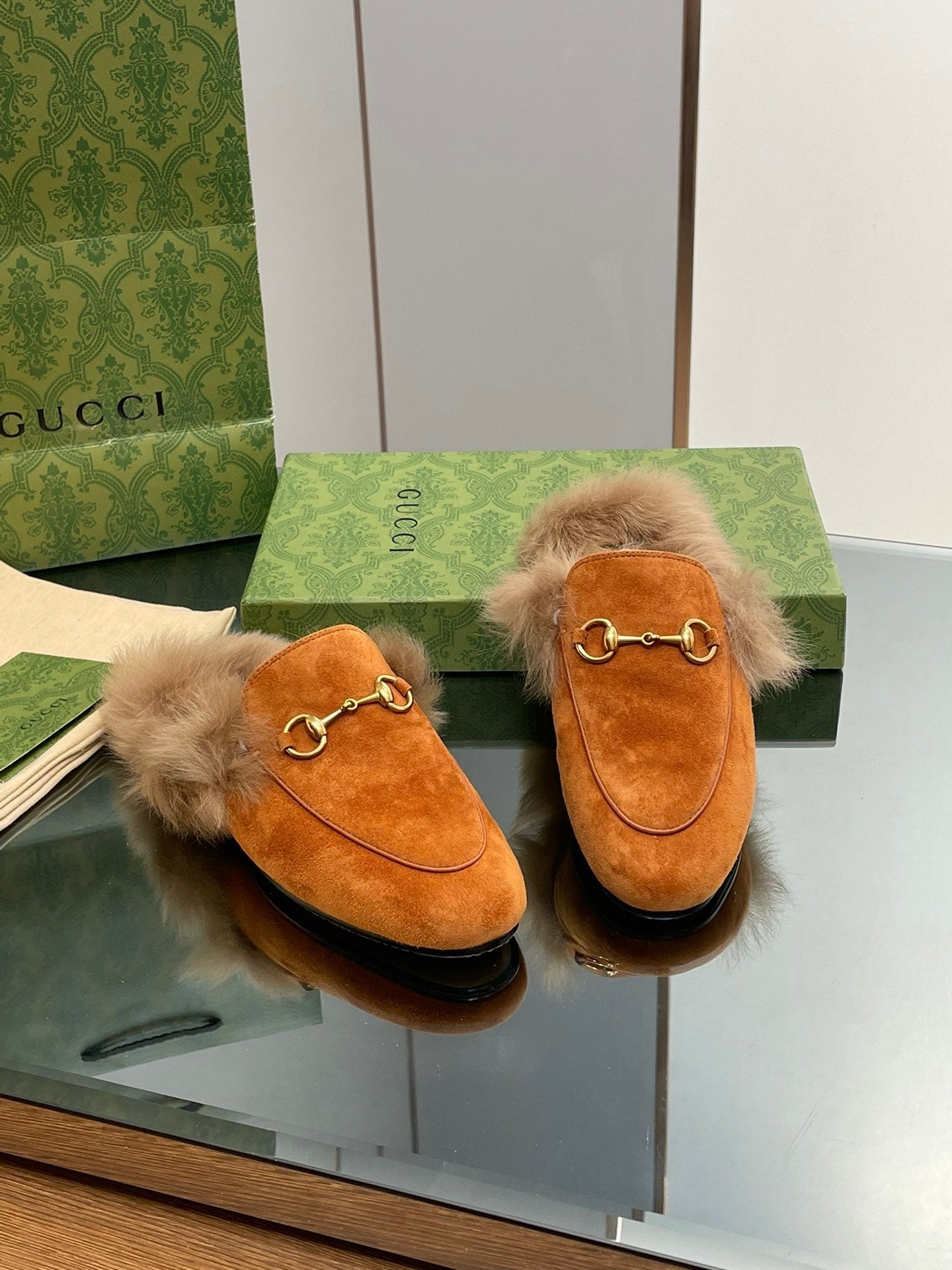 GUCCI HORSEBIT MULE IN BRONZE ORANGE SUEDE AND LAMB WOOL LINING