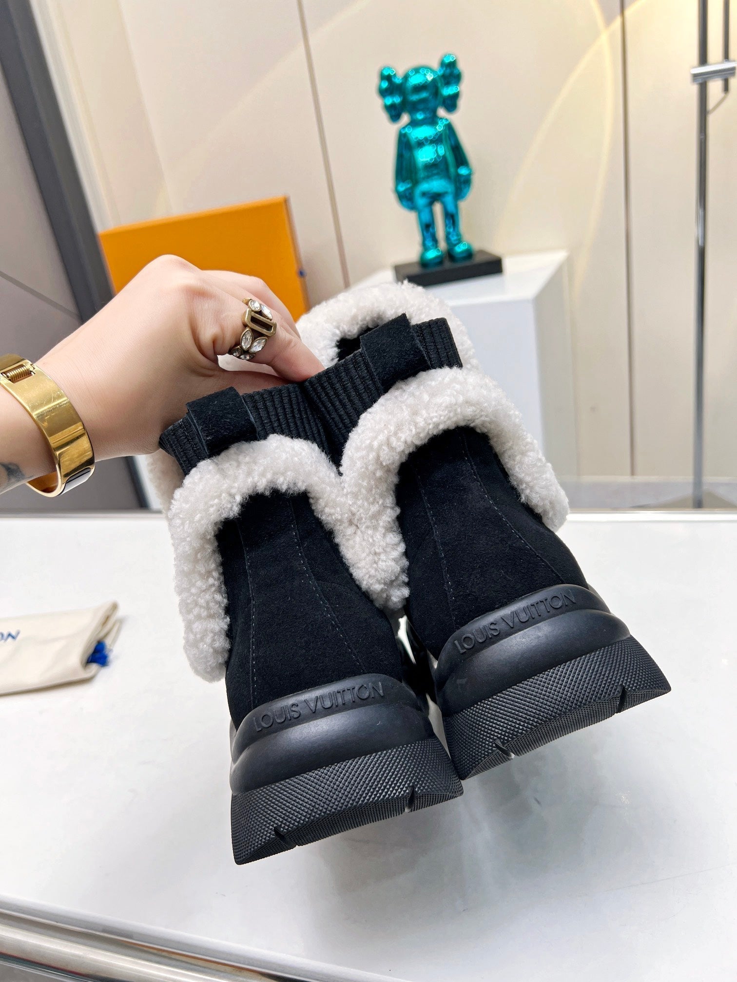 LOUIS VUITTON LV RUBY FLAT ANKLE BOOT IN BLACK SUEDE CALF LEATHER AND WHITE SHEARLING