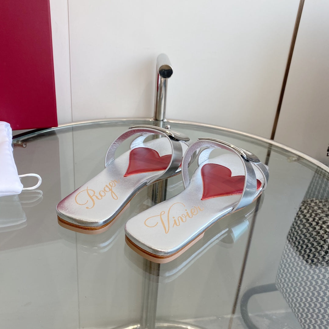VIV' BY THE SEA LOVE METAL MULES IN SILVER PATENT CALFSKIN
