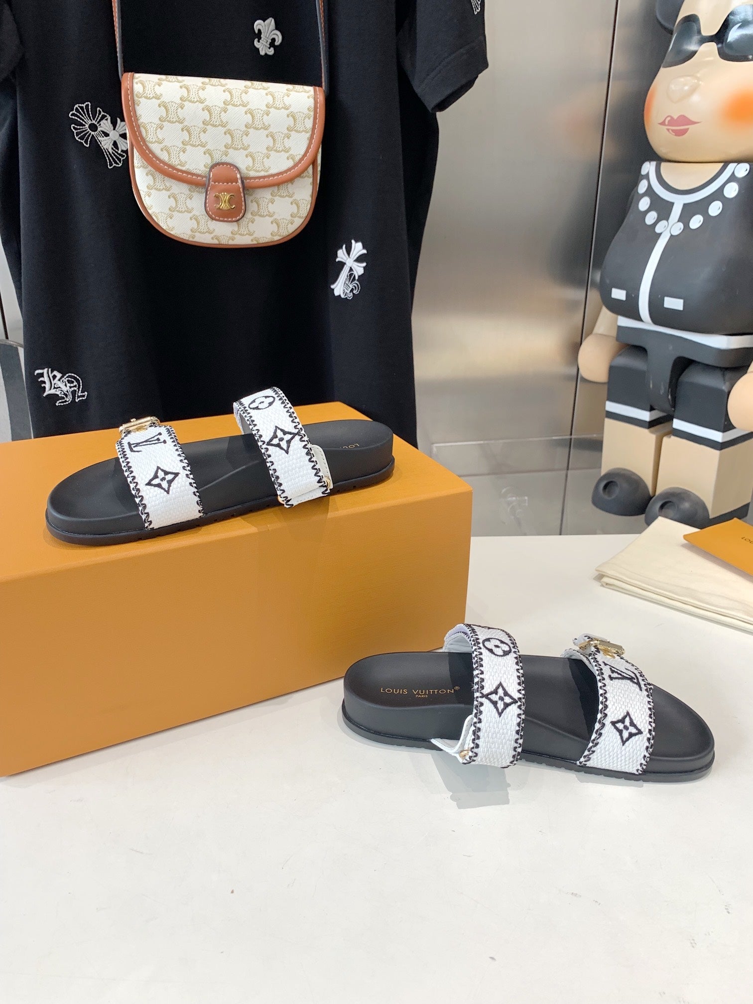 LOUIS VUITTON LV WOMEN SUNSET DAD SANDAL IN WHITE MIX BLACK MONOGRAM FABRIC MULE