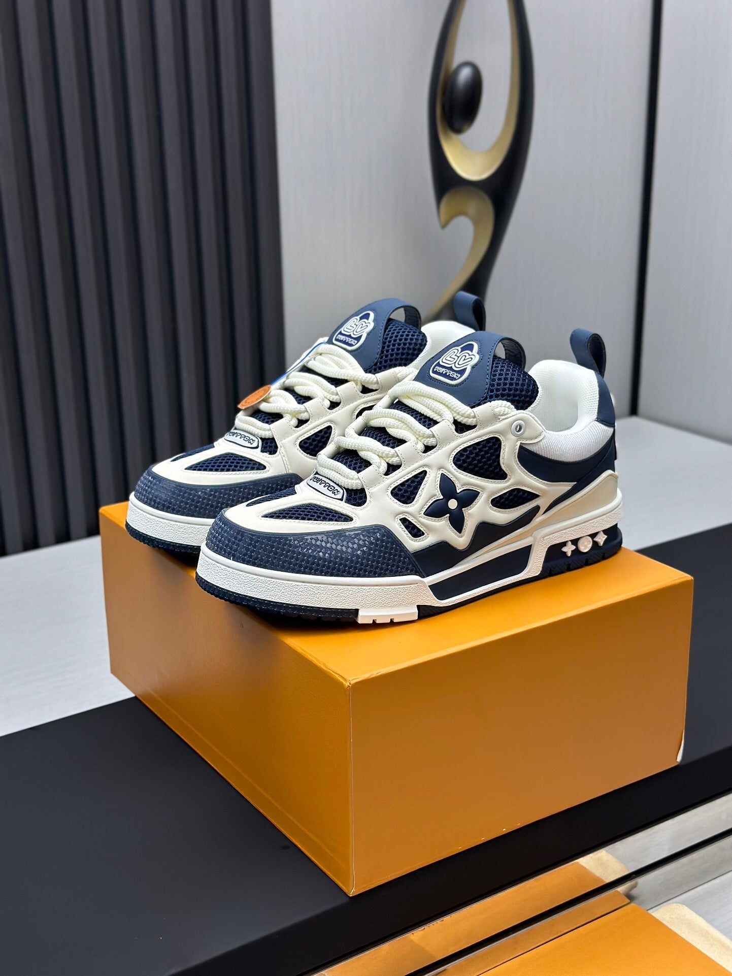 LOUIS VUITTON LV SKATE SNEAKER IN WHITE MIX NAVY BLUE CALFSKIN