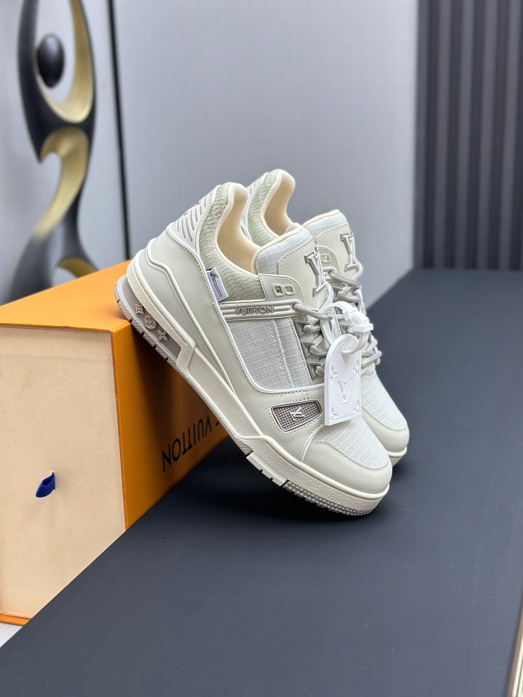 LOUIS VUITTON LV TRAINER SNEAKER IN GREY CALFSKIN