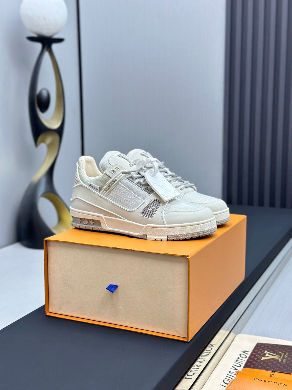 LOUIS VUITTON LV TRAINER SNEAKER IN GREY CALFSKIN