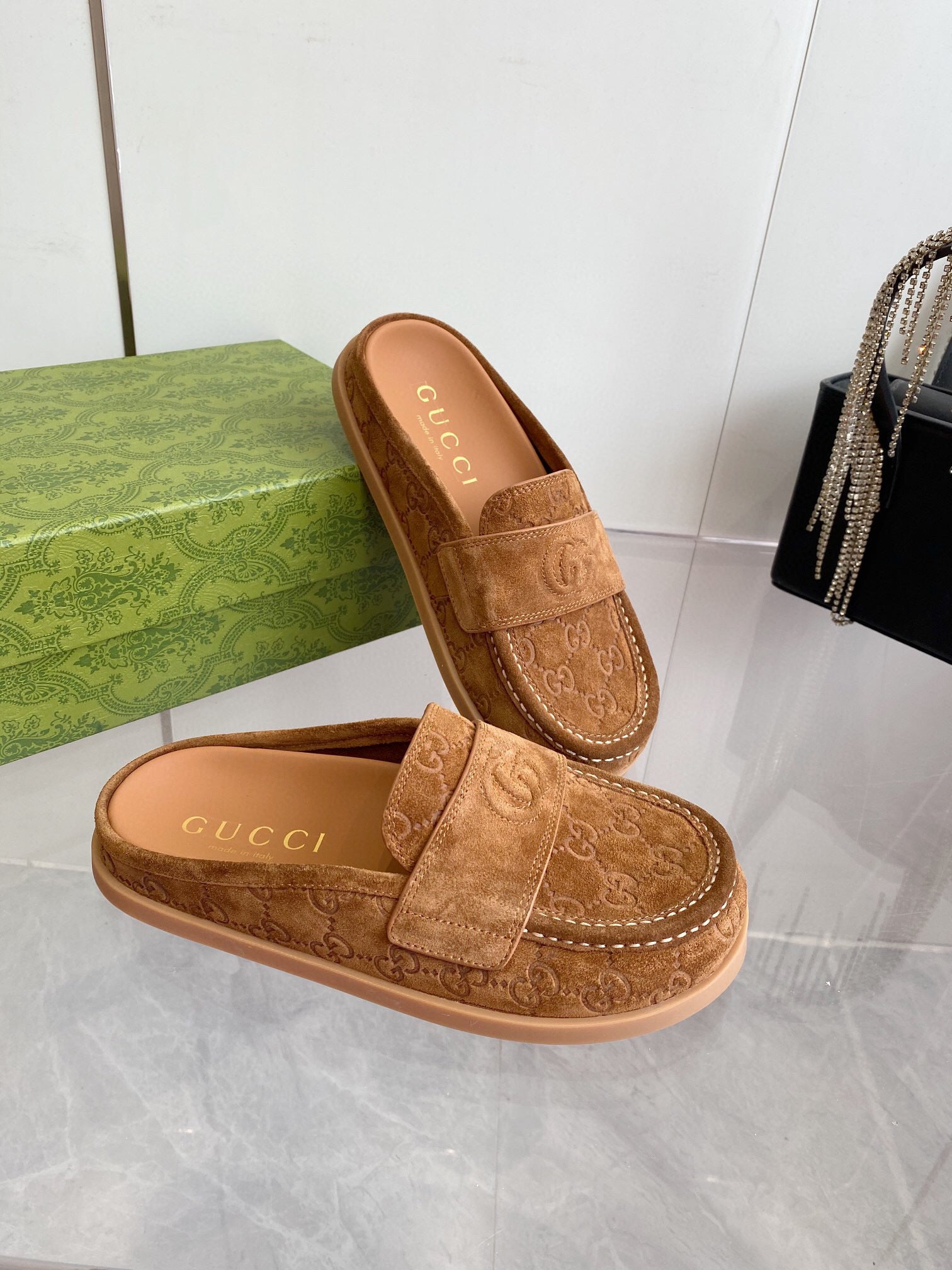 GUCCI LOAFERS IN BROWN MONOGRAM EMBOSSED SUEDE