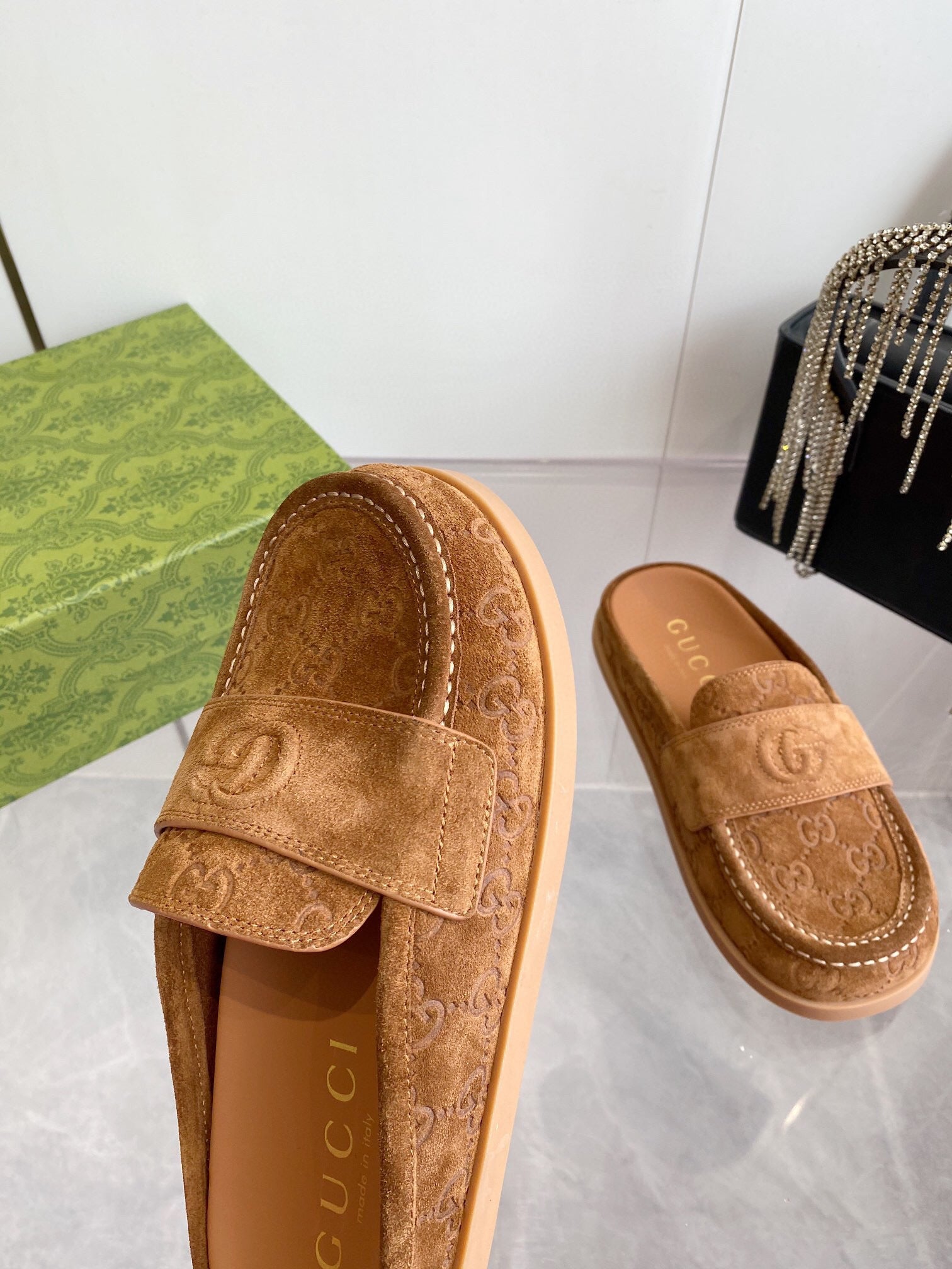 GUCCI LOAFERS IN BROWN MONOGRAM EMBOSSED SUEDE