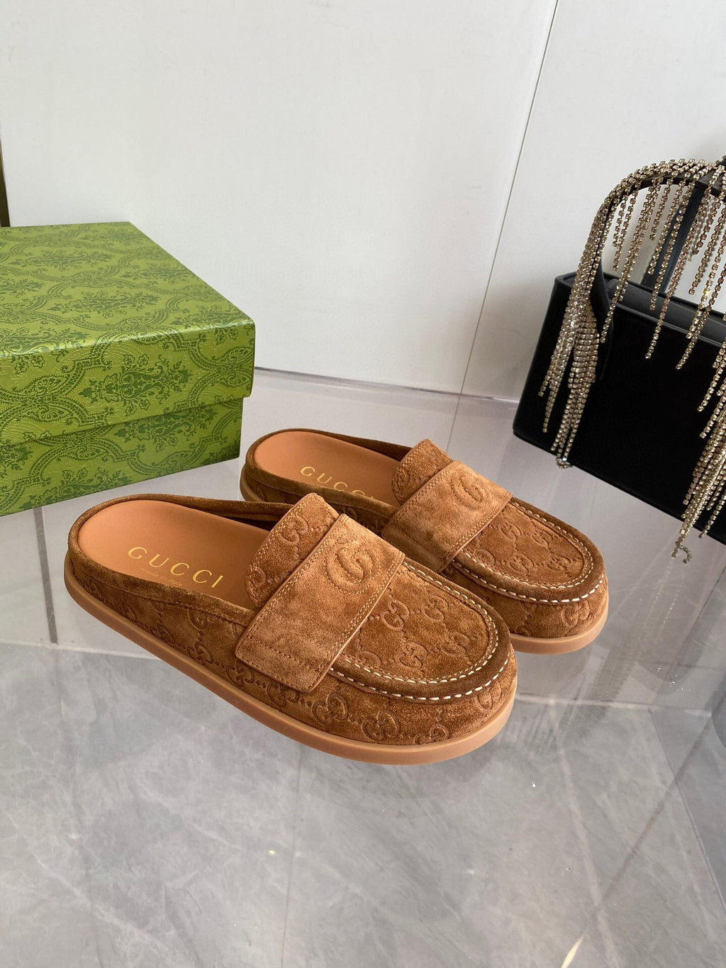 GUCCI LOAFERS IN BROWN MONOGRAM EMBOSSED SUEDE