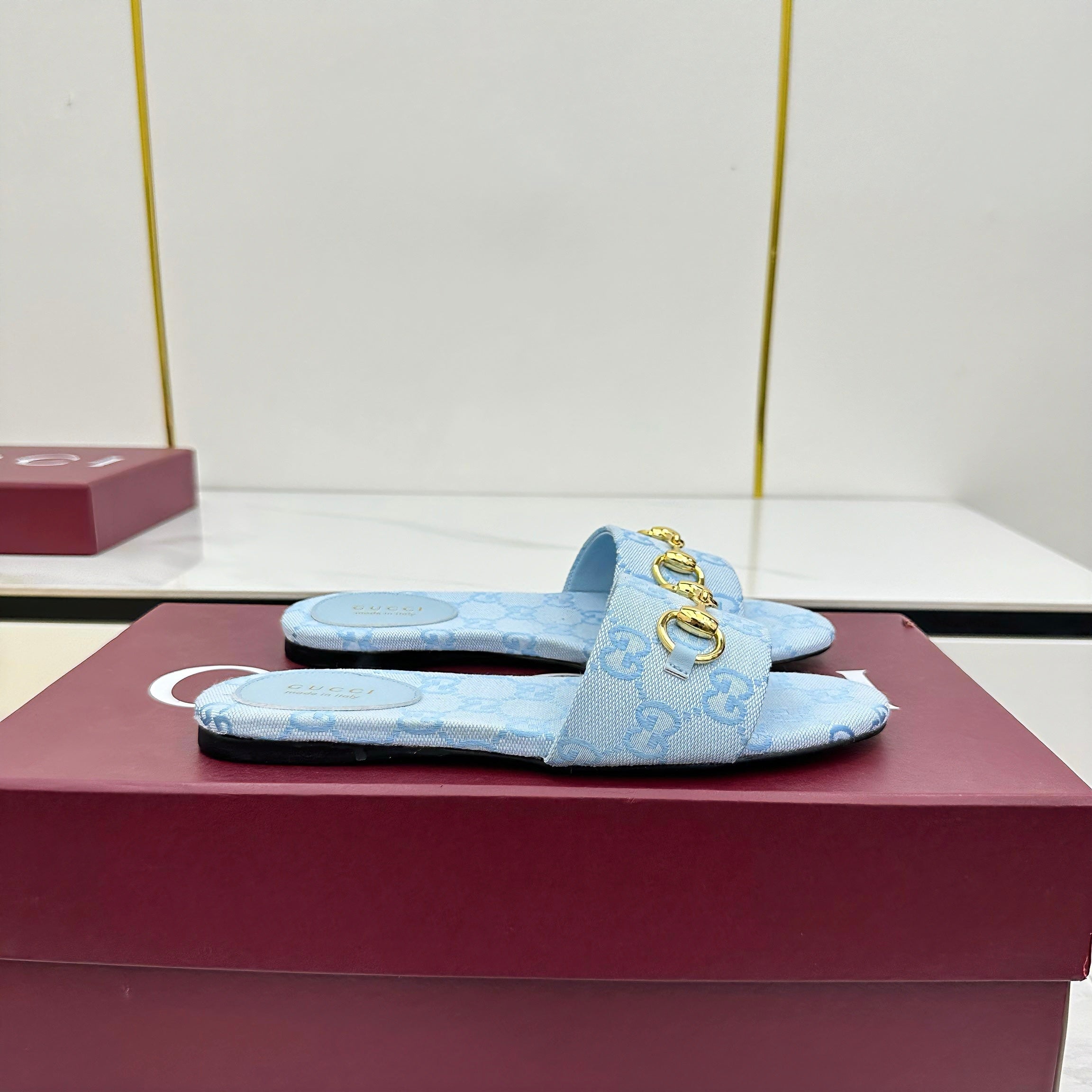 GUCCI SLIDES IN BLUE WITH GOLD HARDWARE