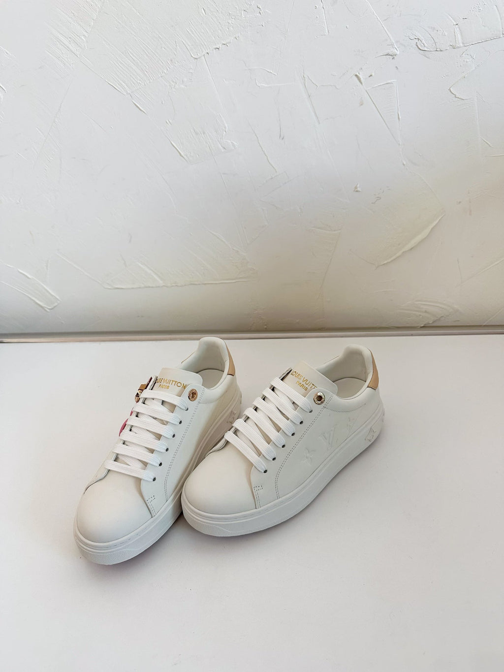 LOUIS VUITTON TIME OUT SNEAKER IN WHITE CALFSKIN