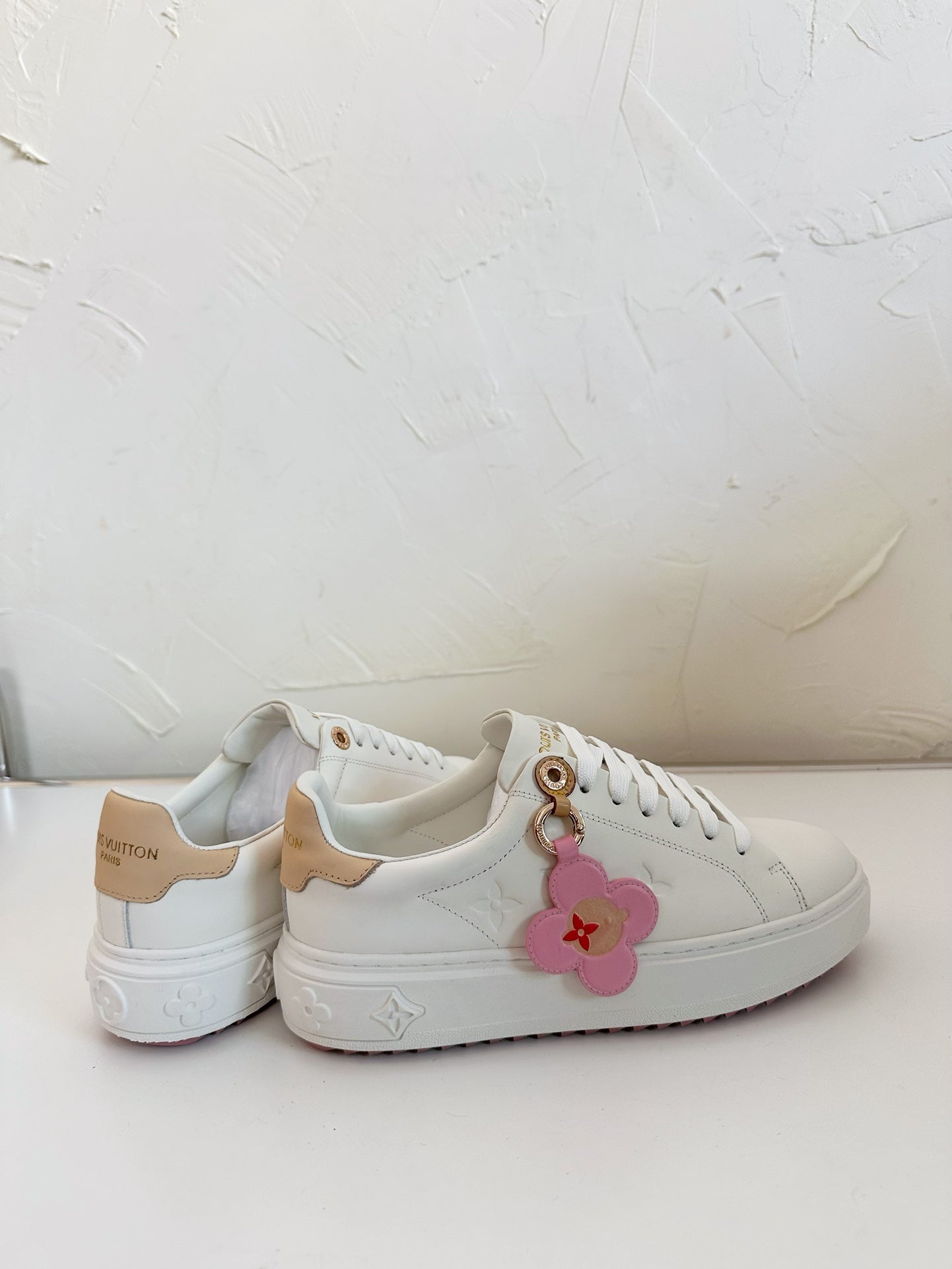 LOUIS VUITTON TIME OUT SNEAKER IN WHITE CALFSKIN