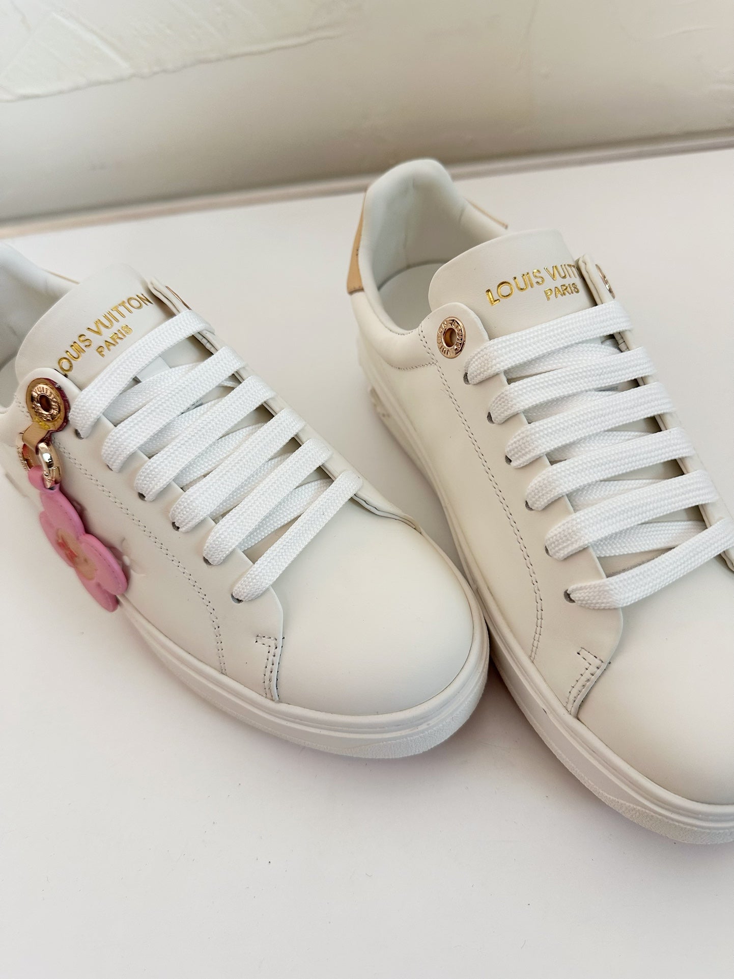 LOUIS VUITTON TIME OUT SNEAKER IN WHITE CALFSKIN