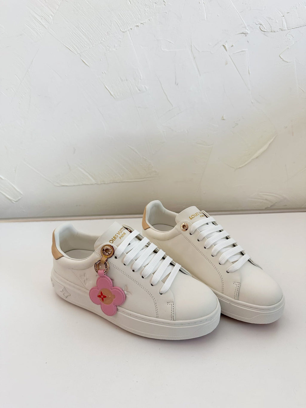 LOUIS VUITTON TIME OUT SNEAKER IN WHITE CALFSKIN