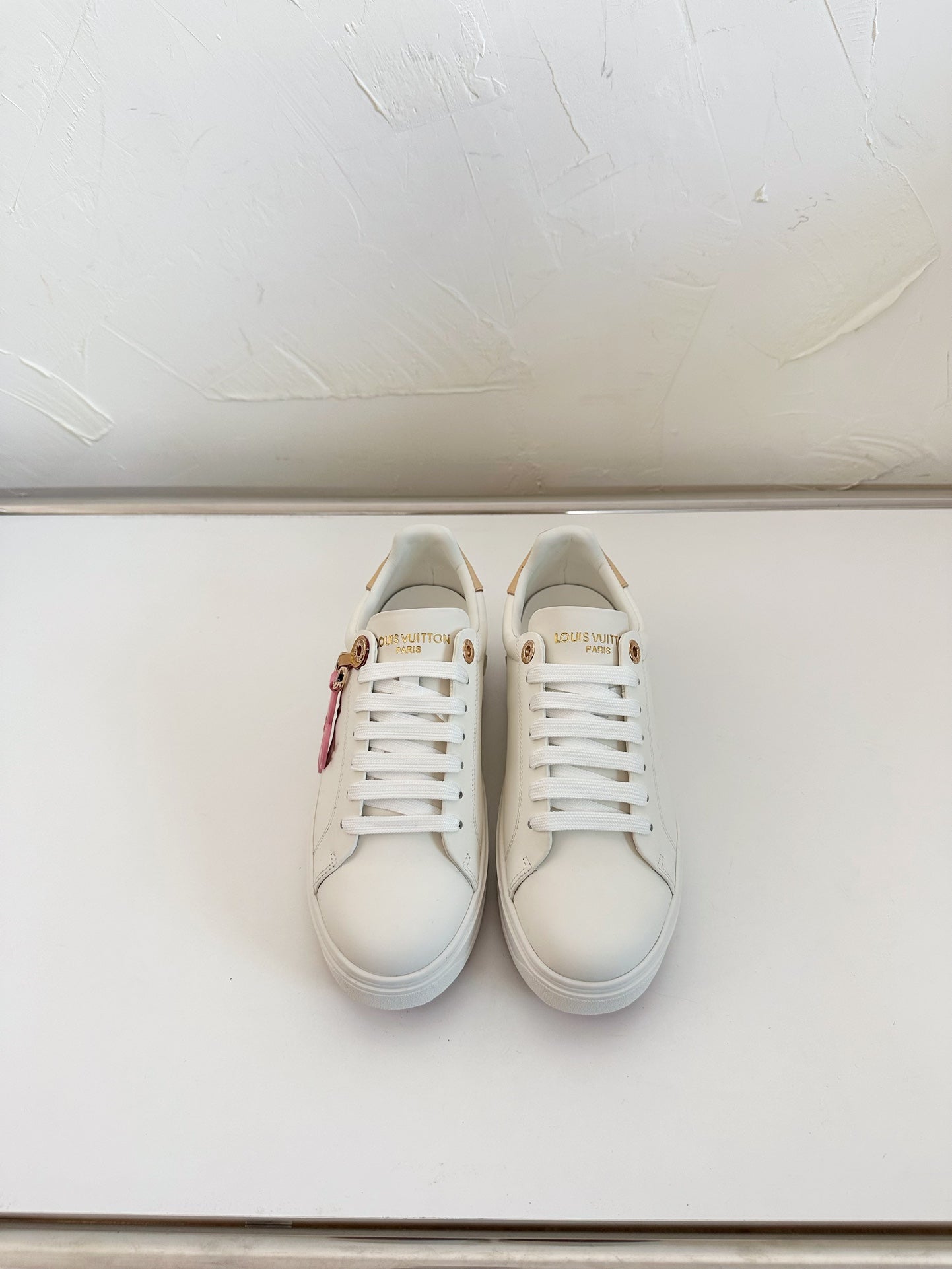 LOUIS VUITTON TIME OUT SNEAKER IN WHITE CALFSKIN