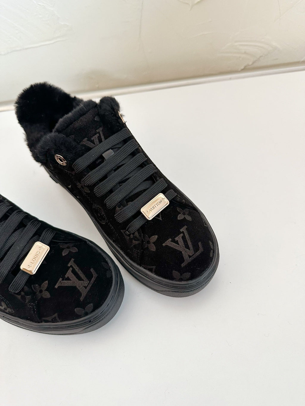 LOUIS VUITTON TIME OUT SNEAKER IN BLACK MONOGRAM EMBOSSED SUEDE WITH FLEECE LINING