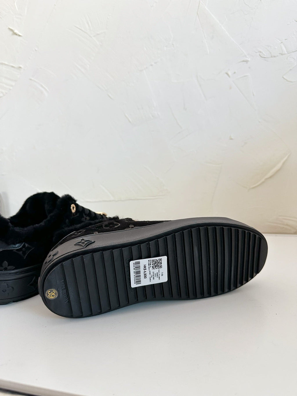 LOUIS VUITTON TIME OUT SNEAKER IN BLACK MONOGRAM EMBOSSED SUEDE WITH FLEECE LINING