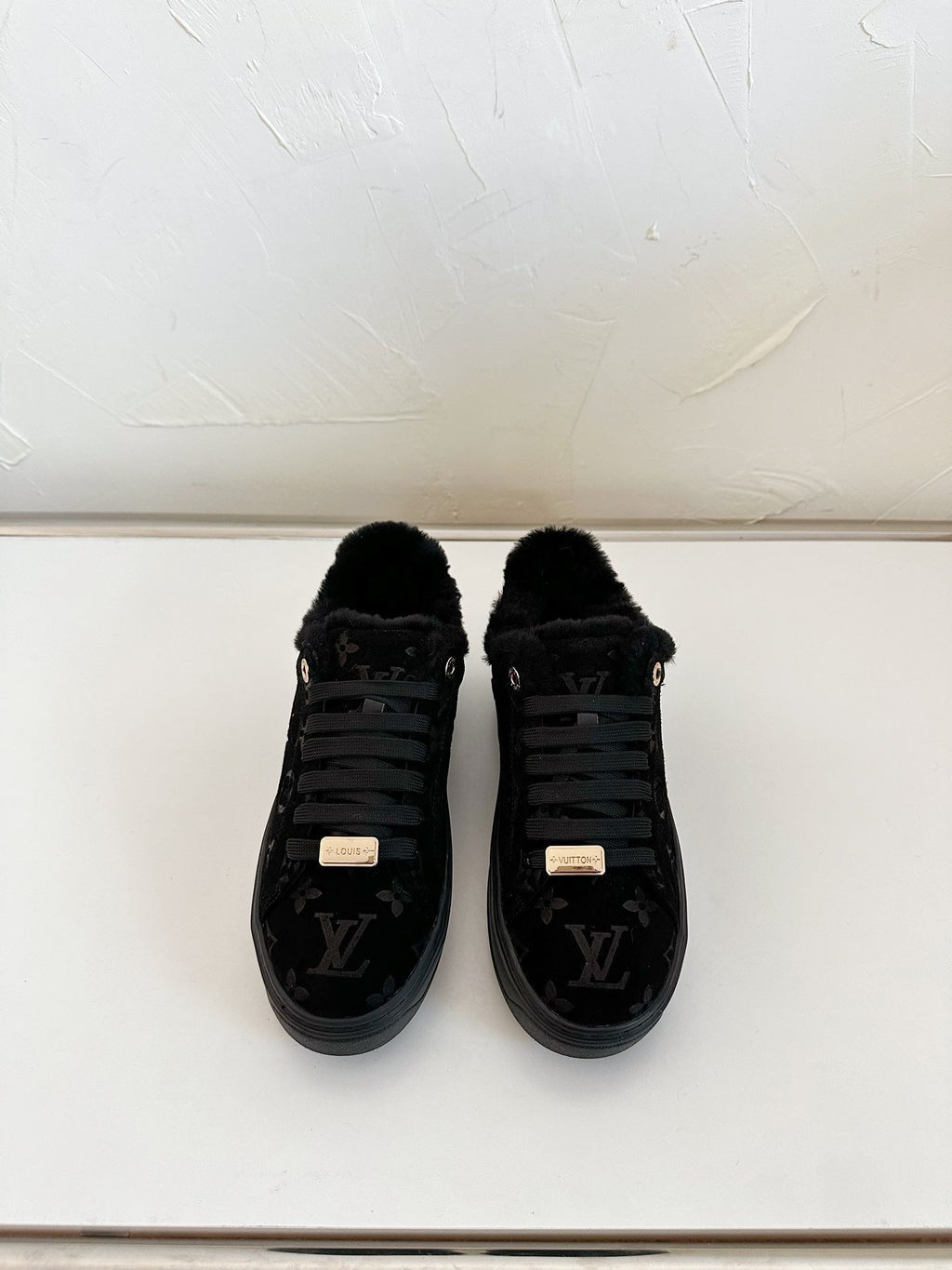 LOUIS VUITTON TIME OUT SNEAKER IN BLACK MONOGRAM EMBOSSED SUEDE WITH FLEECE LINING