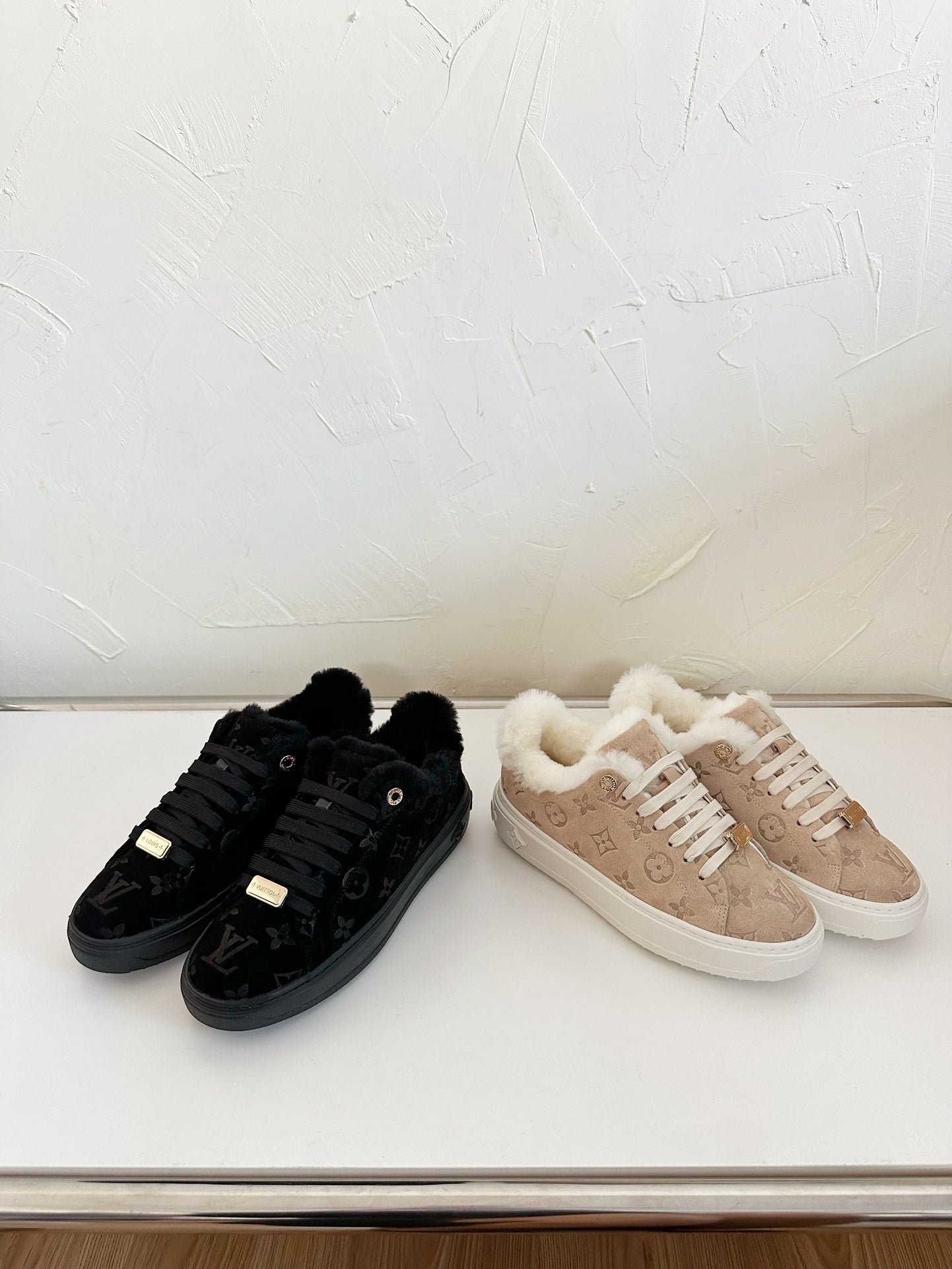 LOUIS VUITTON TIME OUT SNEAKER IN BLACK MONOGRAM EMBOSSED SUEDE WITH FLEECE LINING