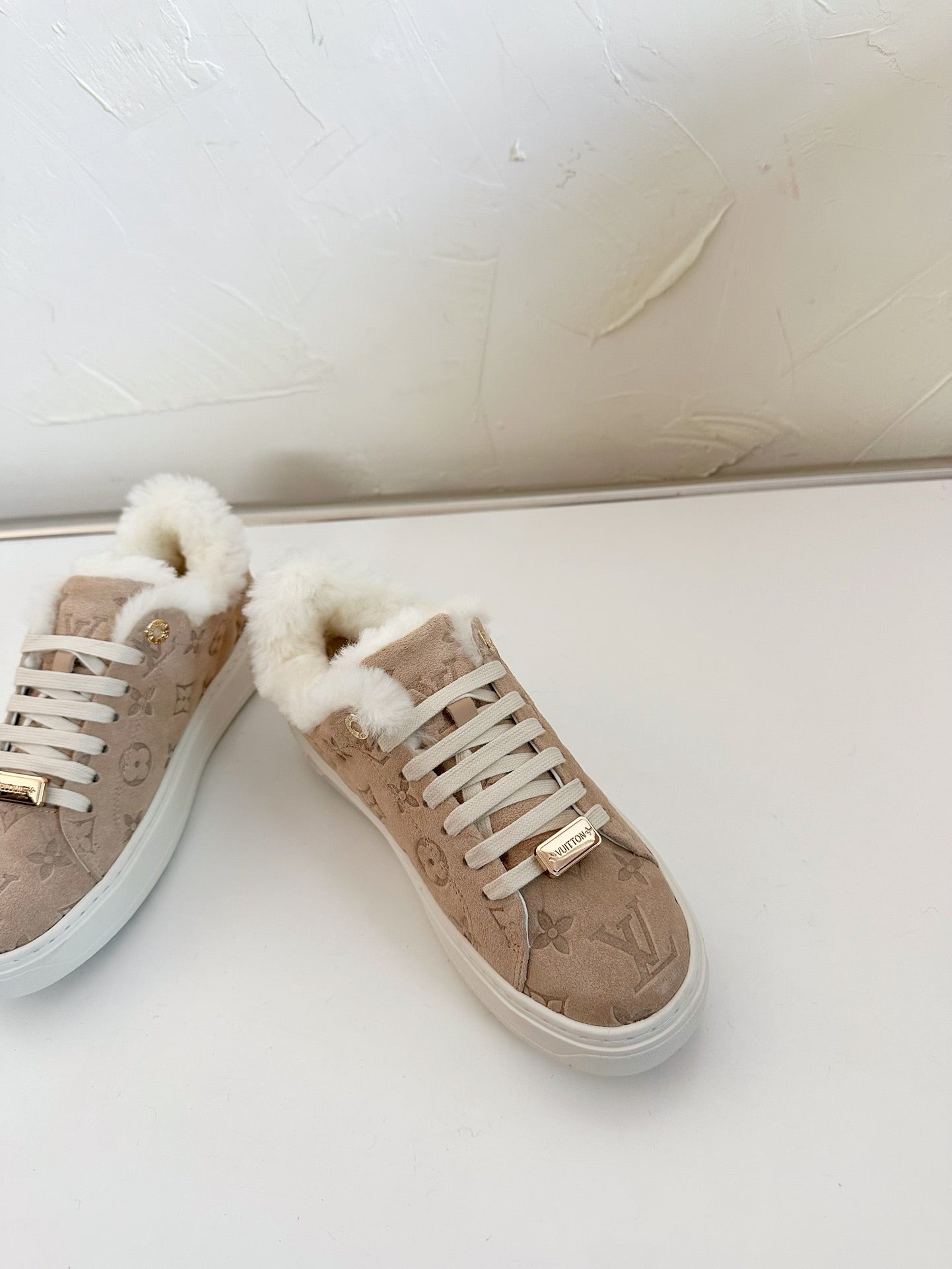LOUIS VUITTON TIME OUT SNEAKER IN DESERT BROWN MONOGRAM EMBOSSED SUEDE WITH FLEECE LINING