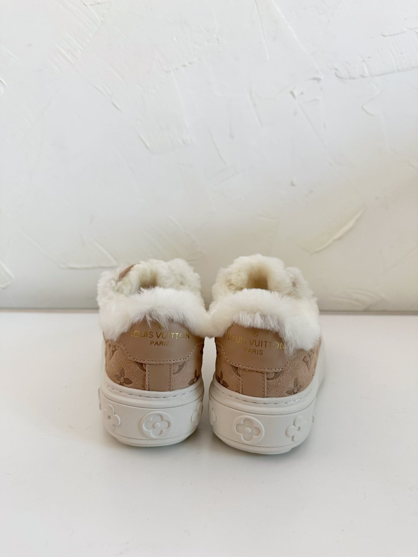 LOUIS VUITTON TIME OUT SNEAKER IN DESERT BROWN MONOGRAM EMBOSSED SUEDE WITH FLEECE LINING