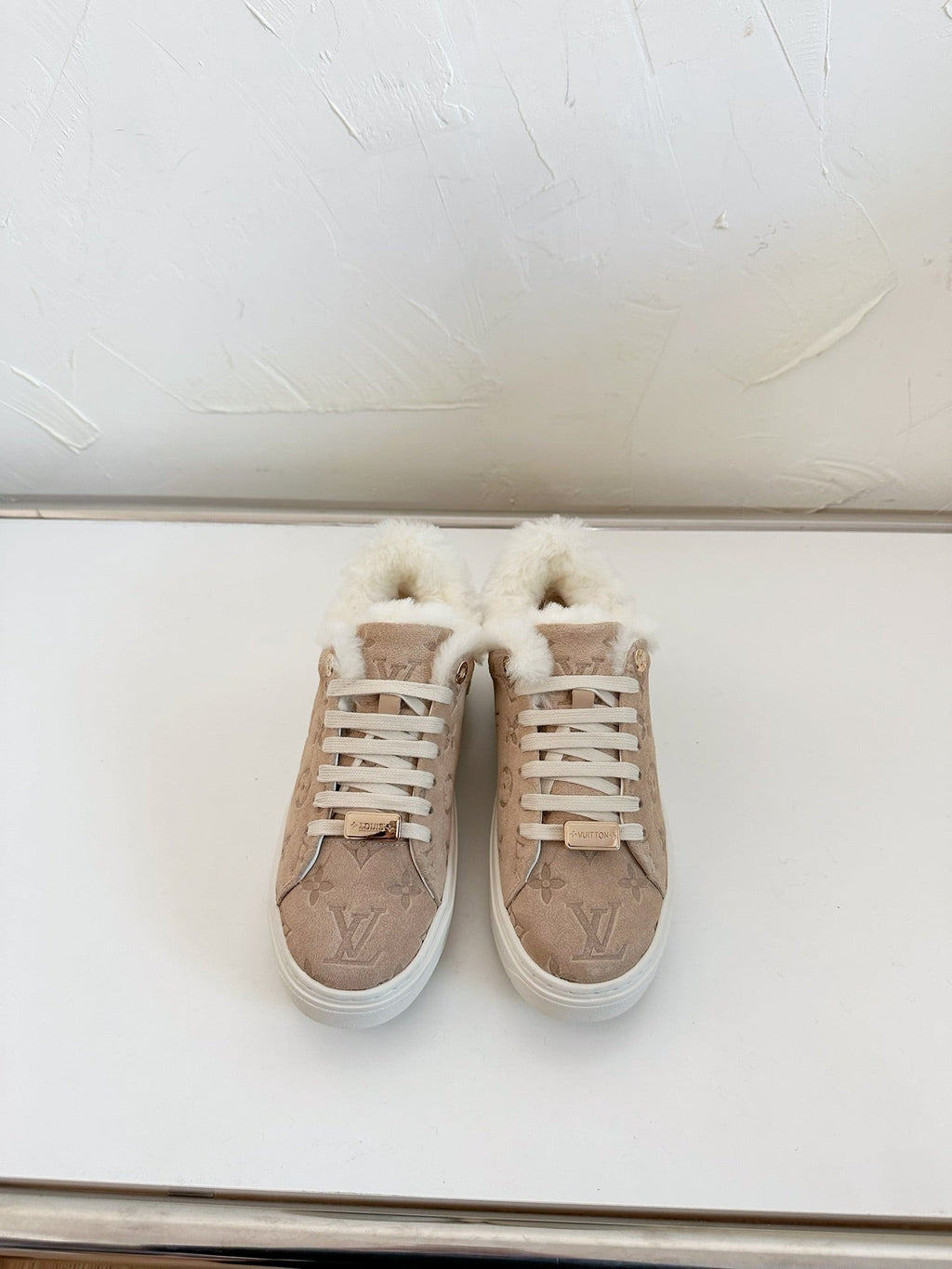 LOUIS VUITTON TIME OUT SNEAKER IN DESERT BROWN MONOGRAM EMBOSSED SUEDE WITH FLEECE LINING